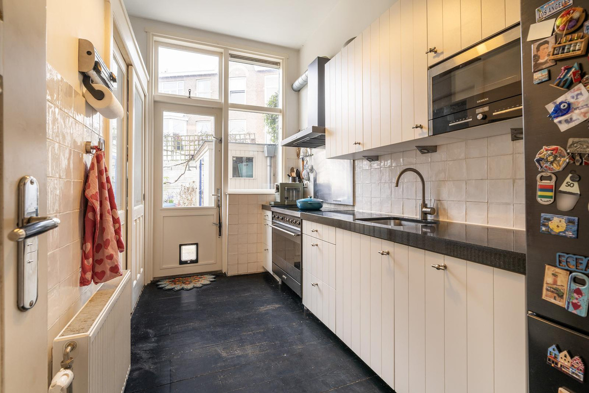 Tussenwoning te koop: Kranenburgweg 27, 'S-Gravenhage
