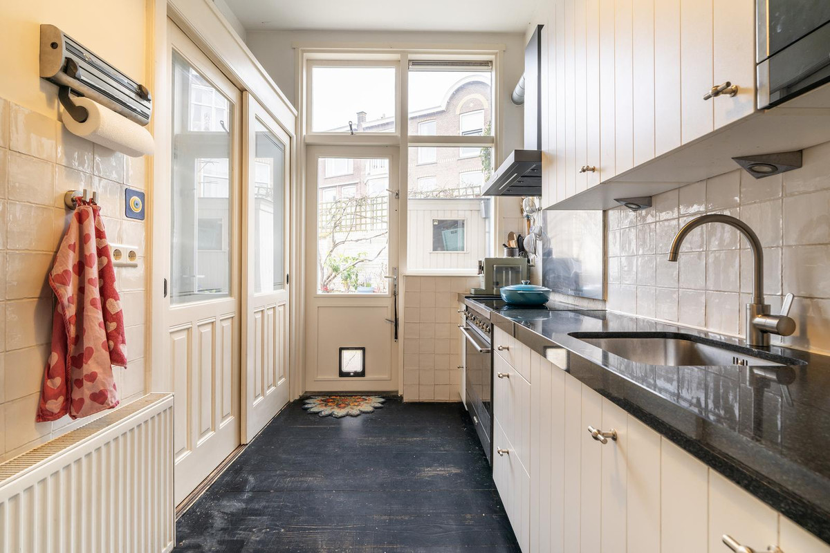 Tussenwoning te koop: Kranenburgweg 27, 'S-Gravenhage