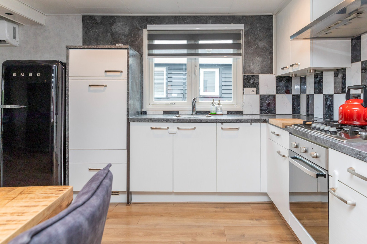 Vrijstaande woning te koop: Rijnbandijk 111-56, Maurik