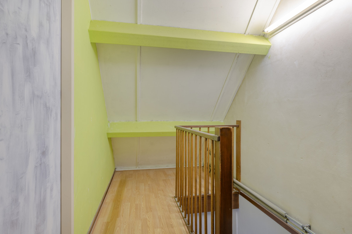 Tussenwoning te koop: Singellaan 57, Heiligerlee