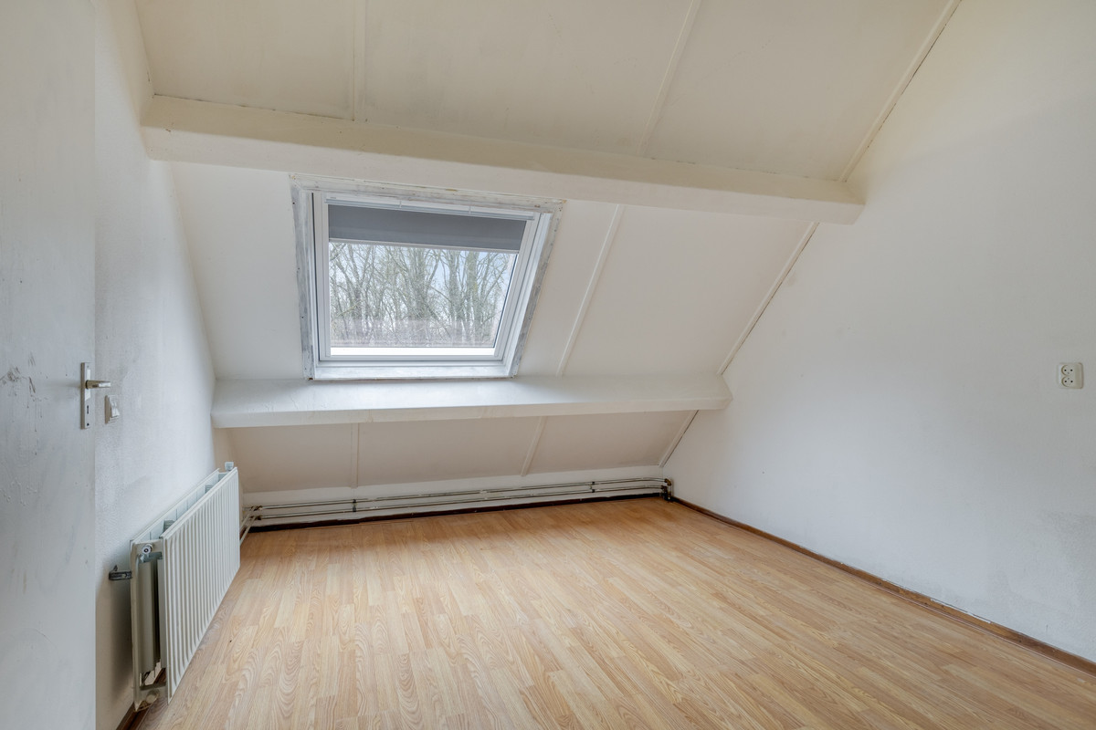Tussenwoning te koop: Singellaan 57, Heiligerlee