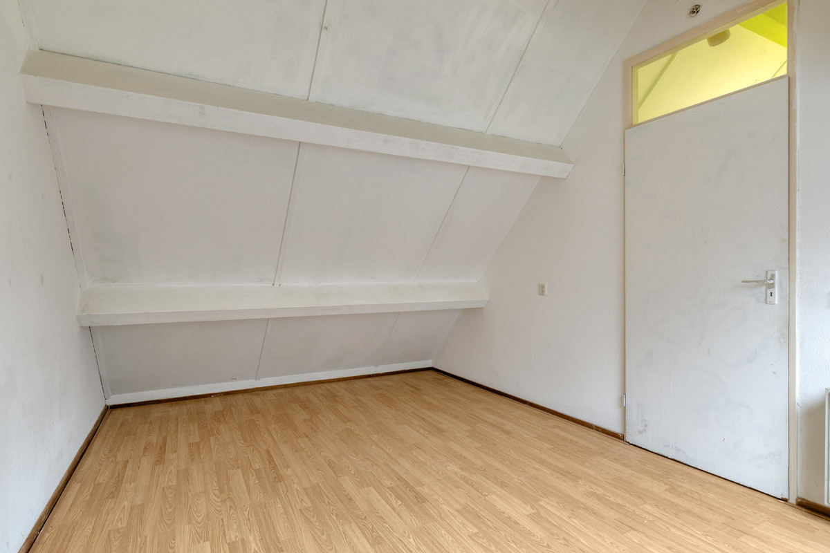 Tussenwoning te koop: Singellaan 57, Heiligerlee