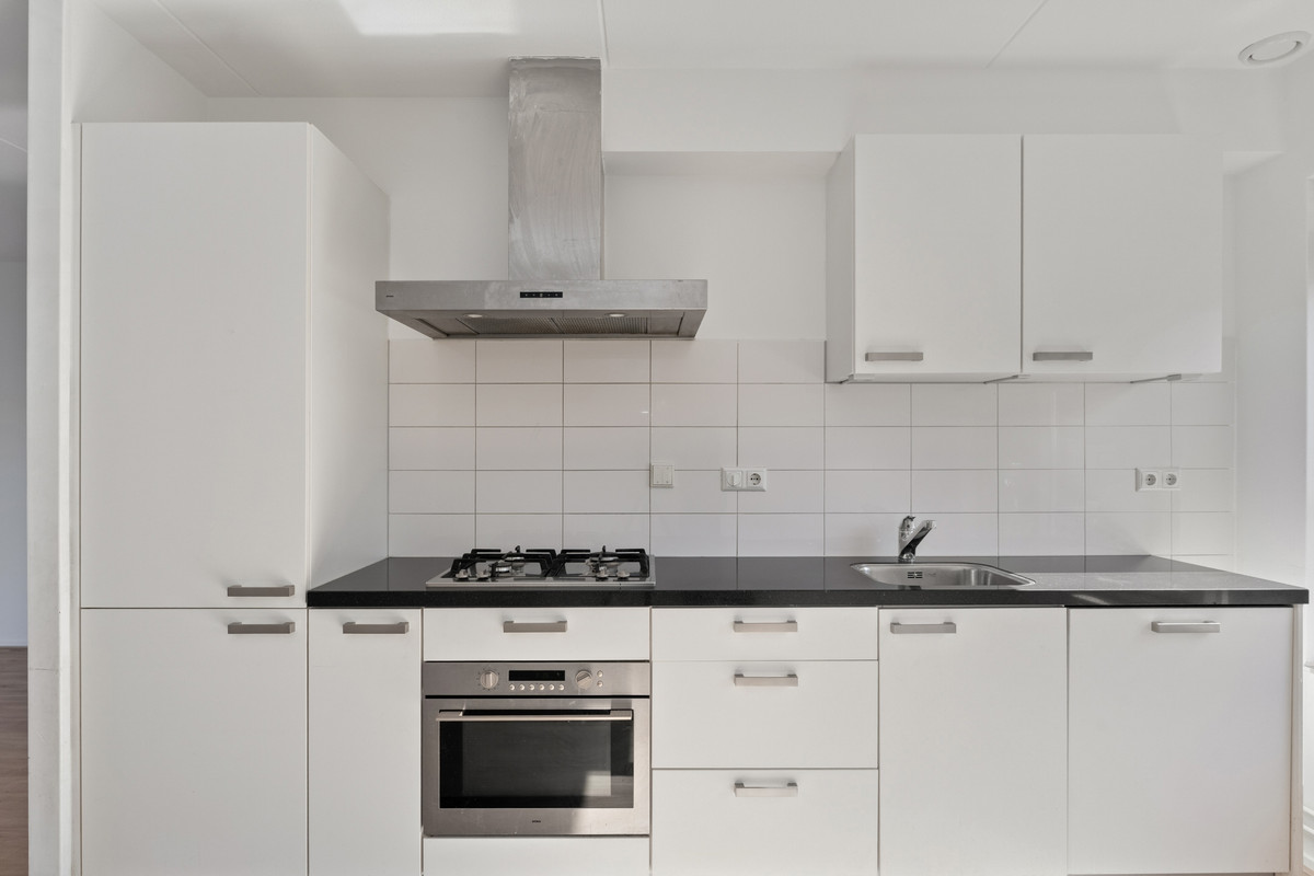 Tussenwoning te koop: Torenpad 52, Boskoop