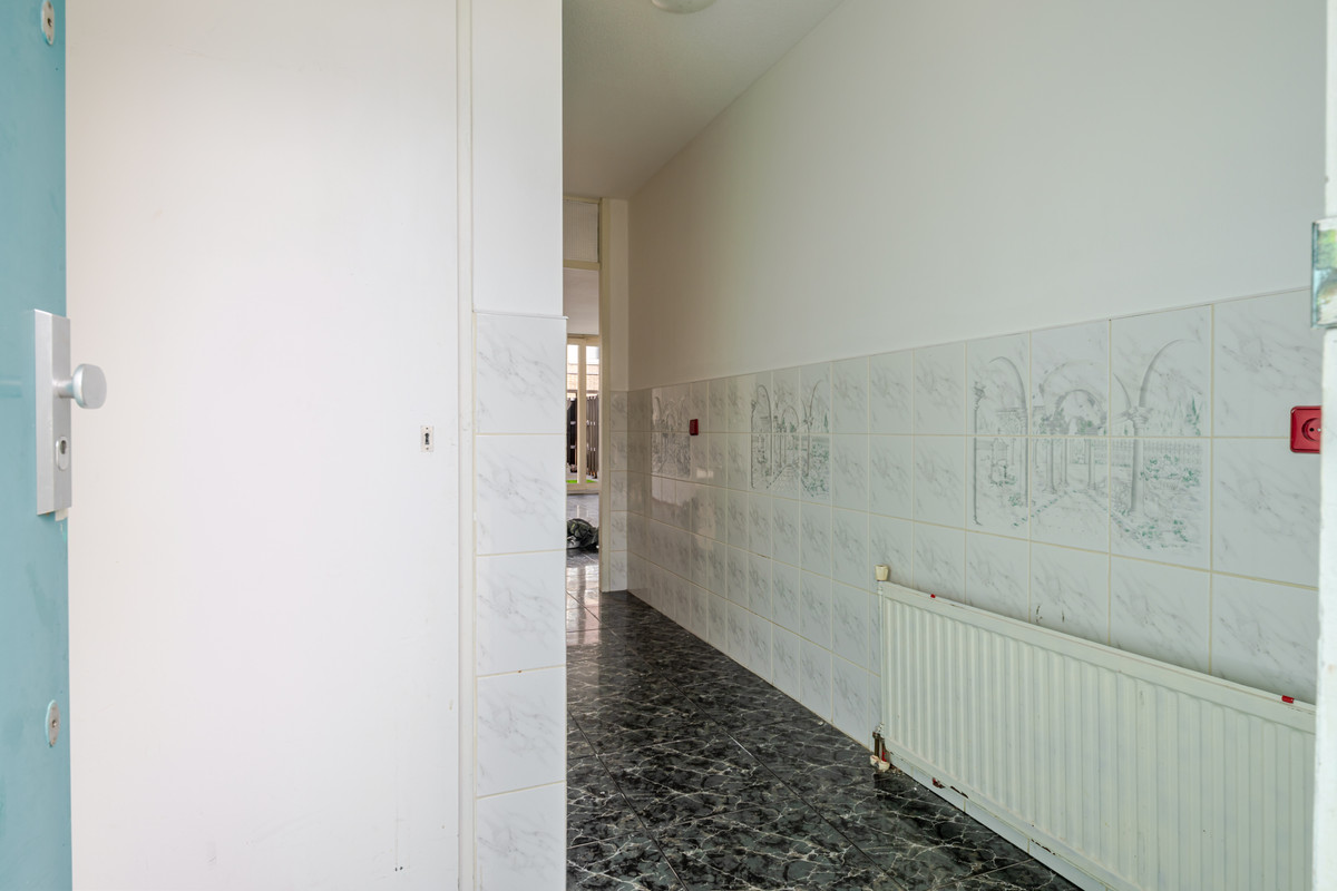Tussenwoning te koop: Houtzagerssingel 120, 'S-Gravenhage