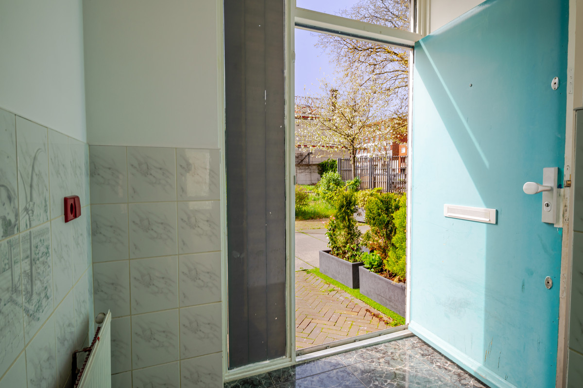 Tussenwoning te koop: Houtzagerssingel 120, 'S-Gravenhage