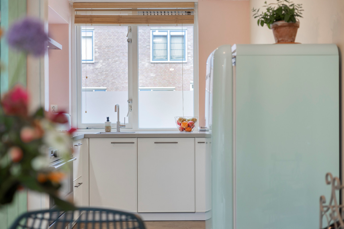 Tussenwoning te koop: Henriette Roland-Holststraat 24, Gorinchem