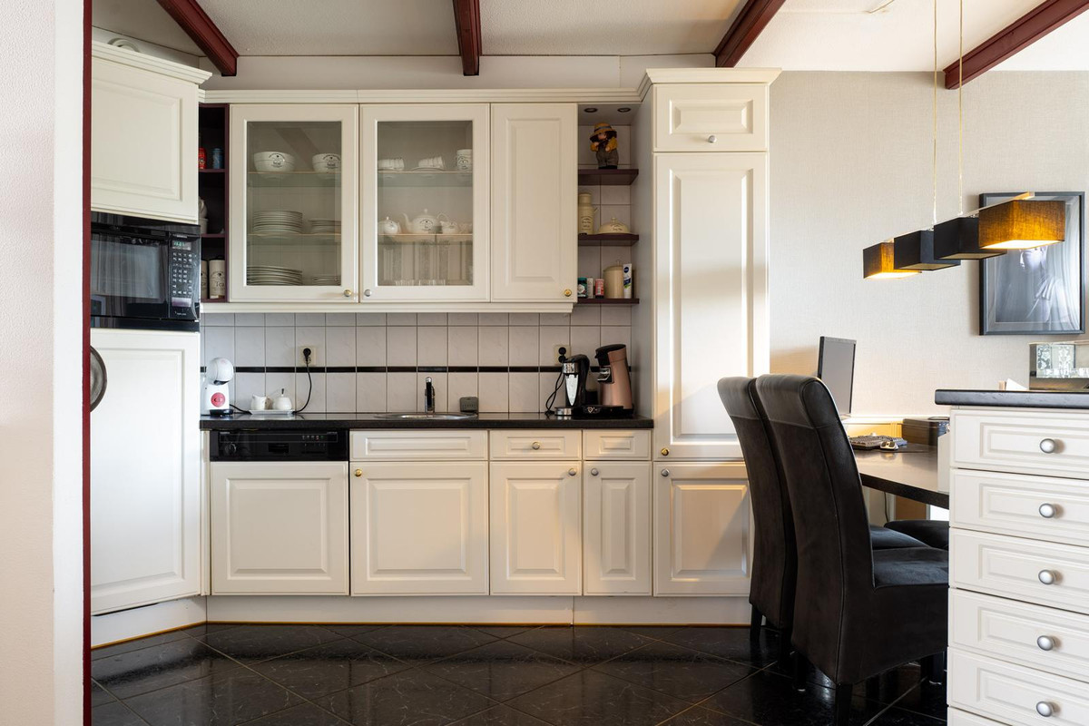 Tussenwoning te koop: de Leemput 11, Halsteren
