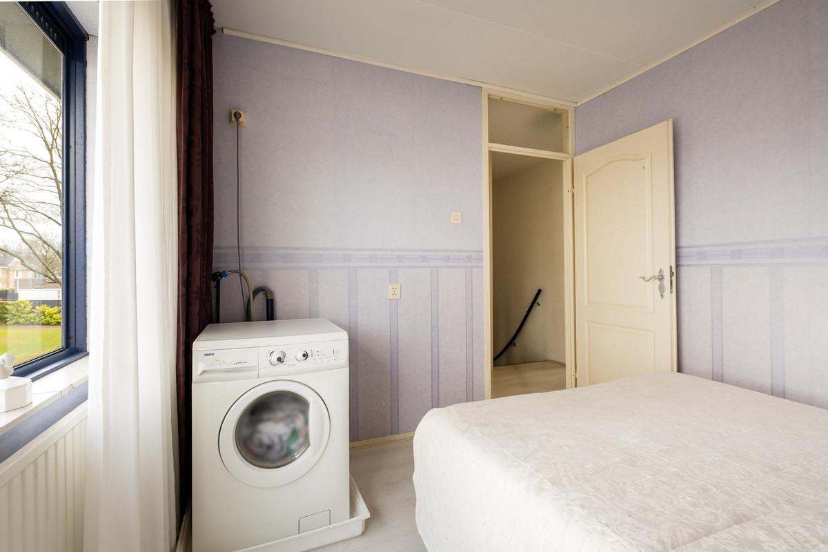 Tussenwoning te koop: de Leemput 11, Halsteren