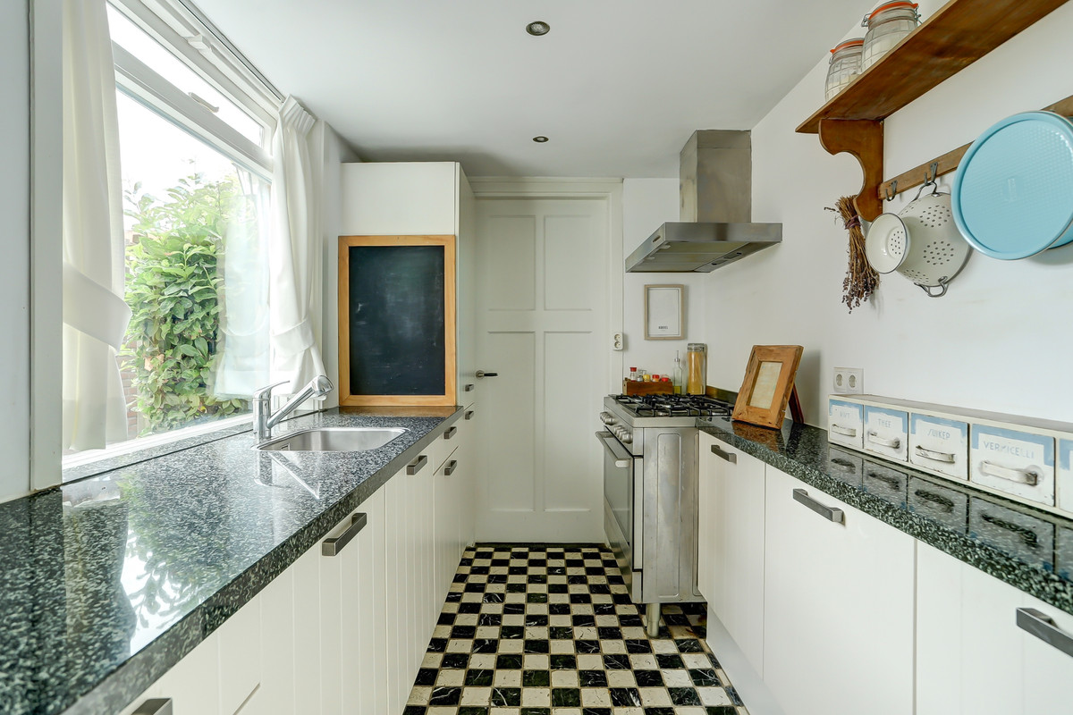 Tussenwoning te koop: Da Costastraat 30, Tilburg