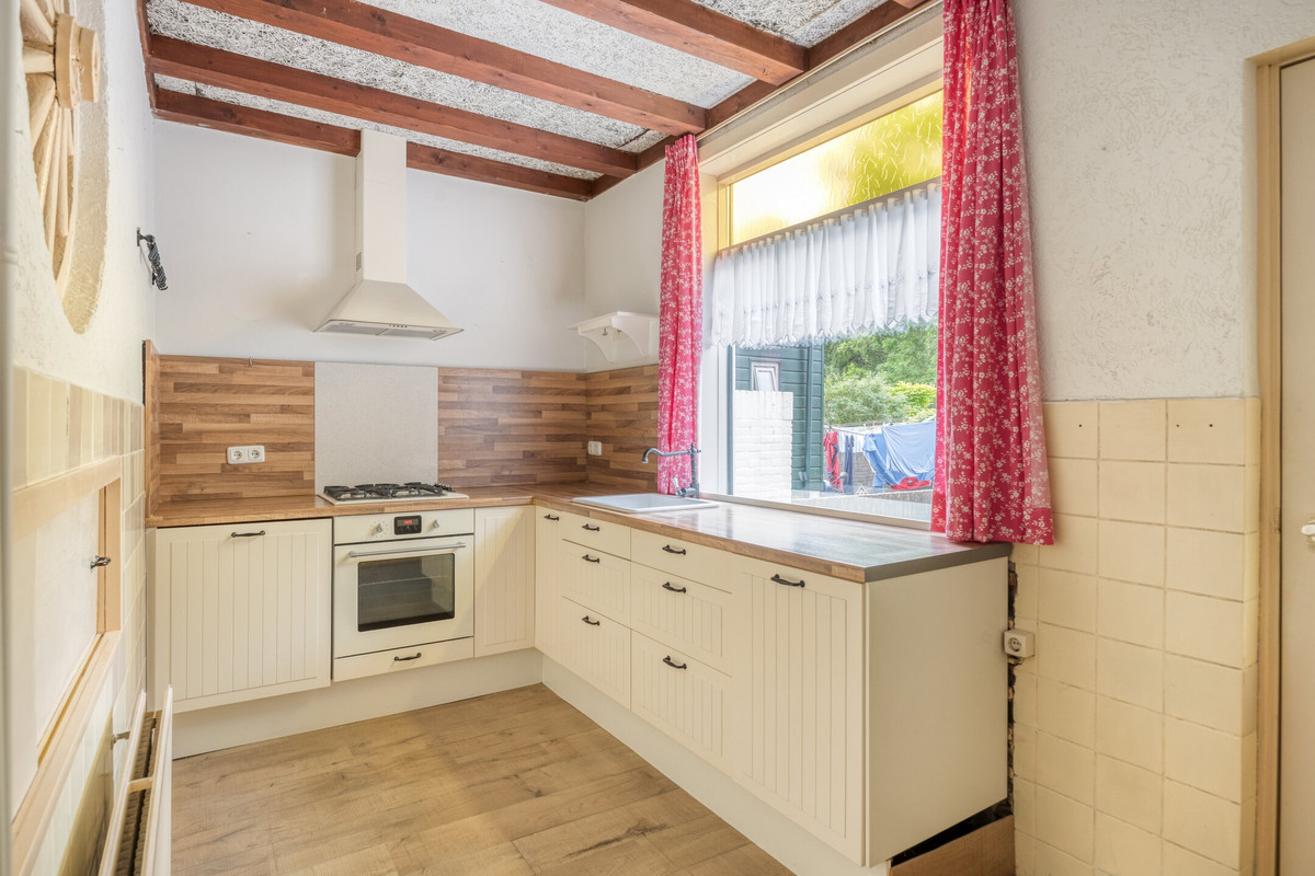 Tussenwoning te koop: Hoofdstraat 86, Terheijden