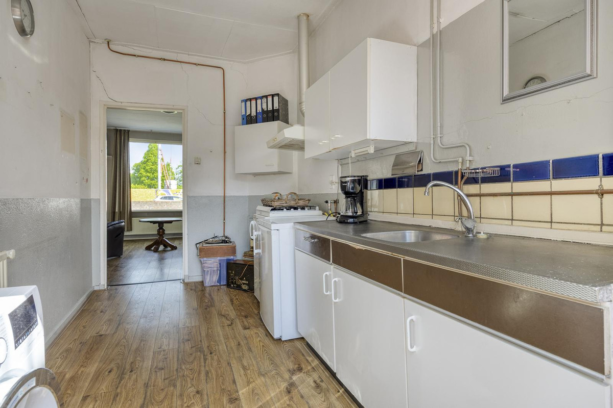 Tussenwoning te koop: Hendrik Westerstraat 109, Oude Pekela