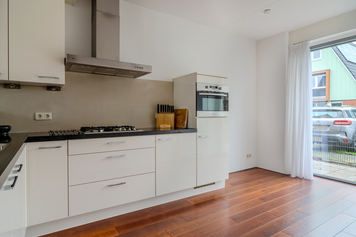 Tussenwoning te koop: Inlaagdijk 141, Zwaag