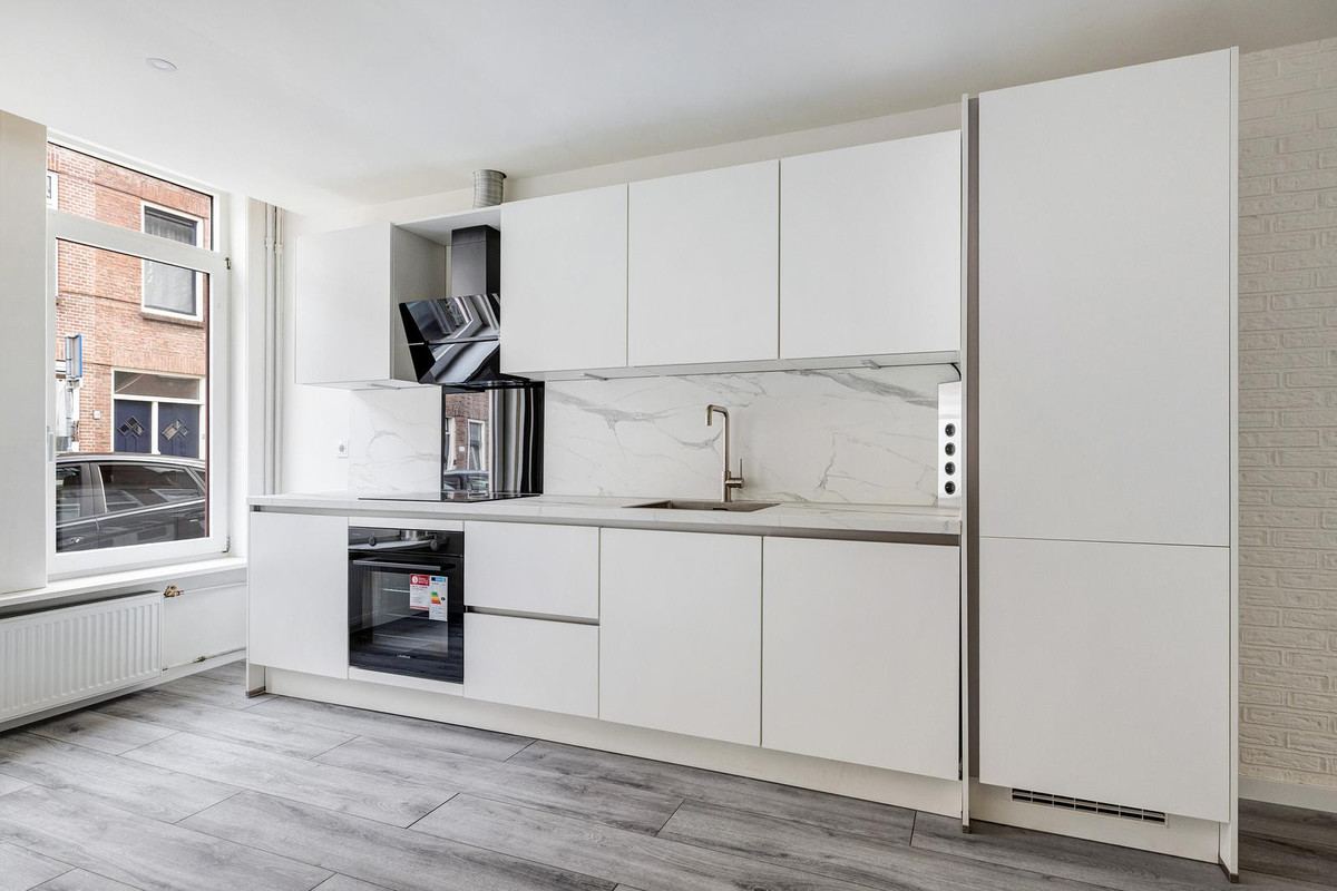 Tussenwoning te koop: Meekrapstraat 33, Rotterdam