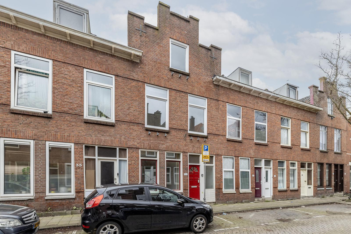 Tussenwoning te koop: Meekrapstraat 33, Rotterdam
