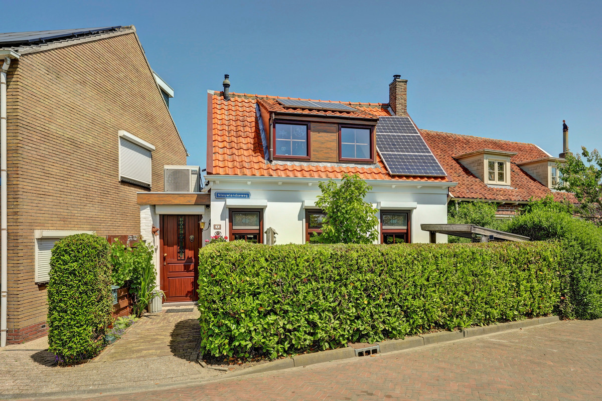Twee-onder-één-kap te koop: Nieuwlandseweg 7, Nieuw- En Sint Joosland