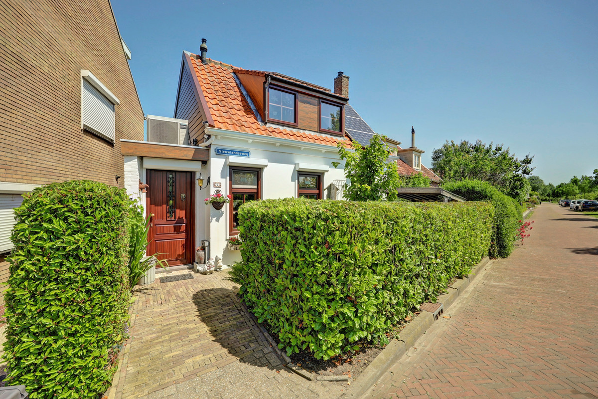 Twee-onder-één-kap te koop: Nieuwlandseweg 7, Nieuw- En Sint Joosland