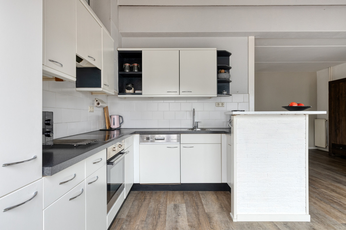 Tussenwoning te koop: De Leemput 31, Halsteren