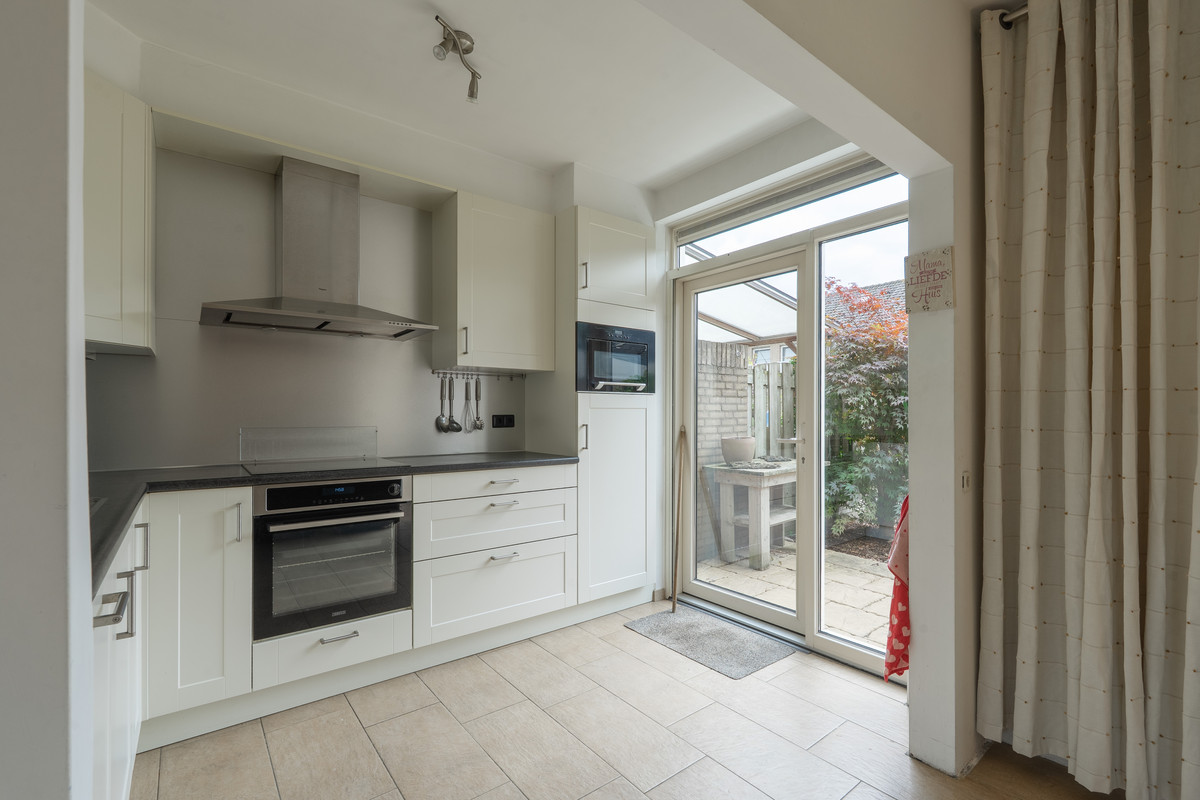 Tussenwoning te koop: Iepenlaan 14, Bemmel