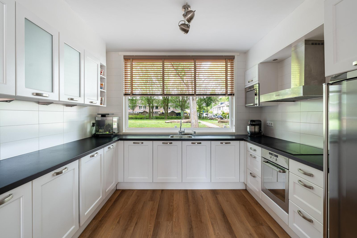 Tussenwoning te koop: Optenoord 8, Rotterdam