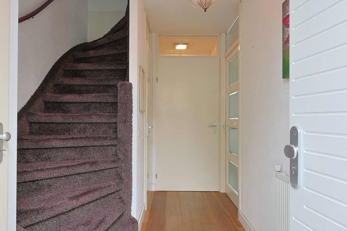 Tussenwoning te koop: Knikeind 21A, Best