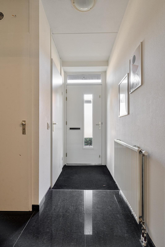 Tussenwoning te koop: Wislaan 76, Uden