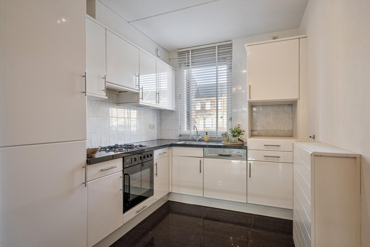 Tussenwoning te koop: Wislaan 76, Uden