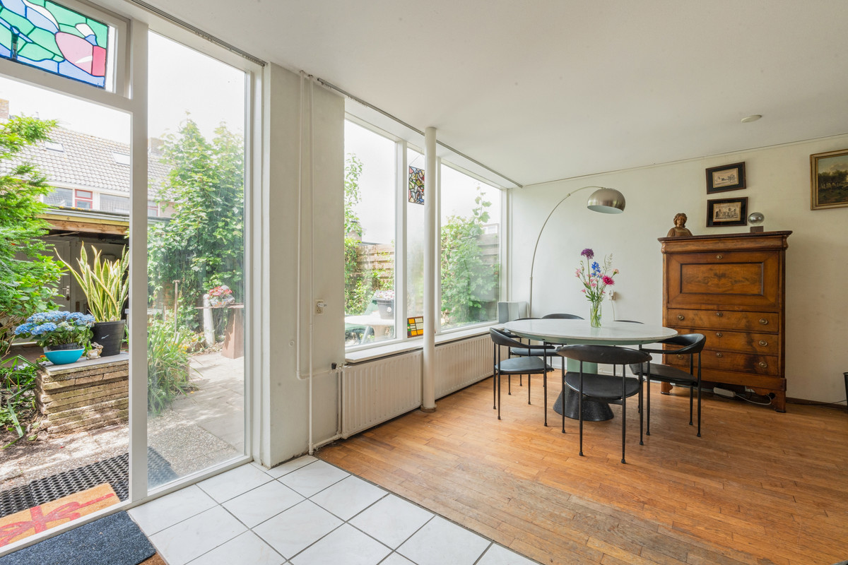Tussenwoning te koop: Bateweg 46, Woubrugge