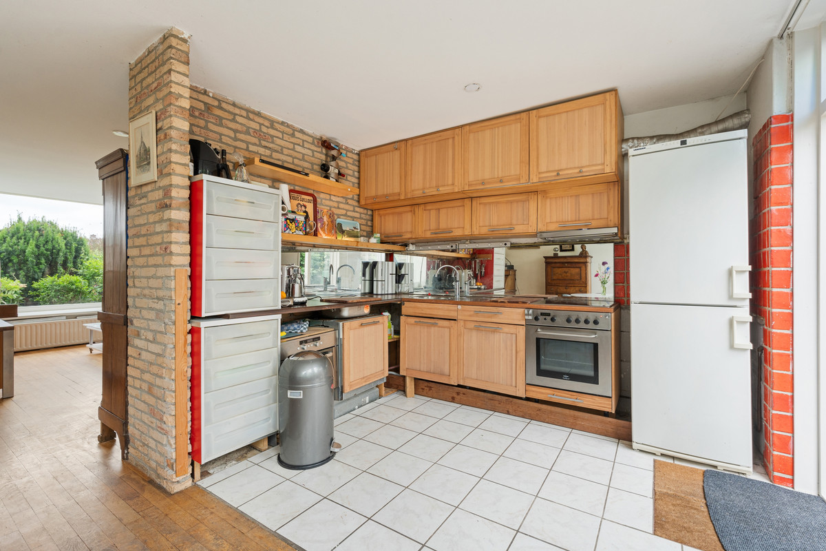 Tussenwoning te koop: Bateweg 46, Woubrugge