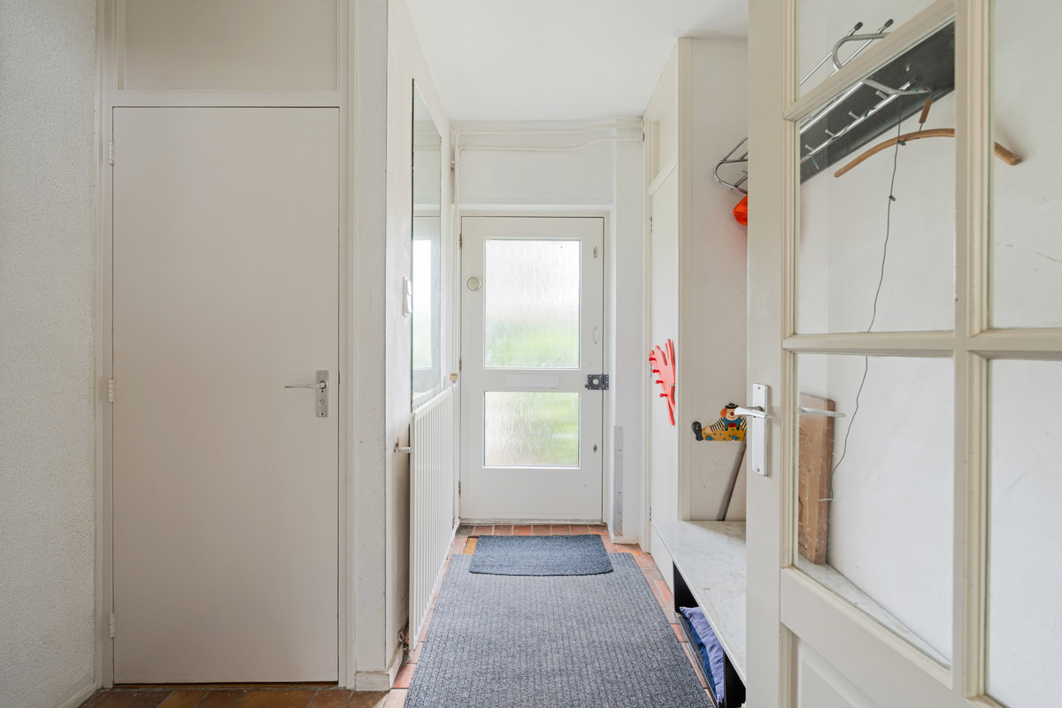 Tussenwoning te koop: Bateweg 46, Woubrugge