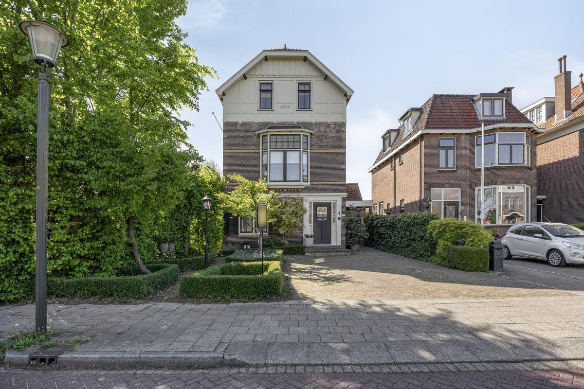 Twee-onder-één-kap te koop: Rozenlaan 1, Boskoop