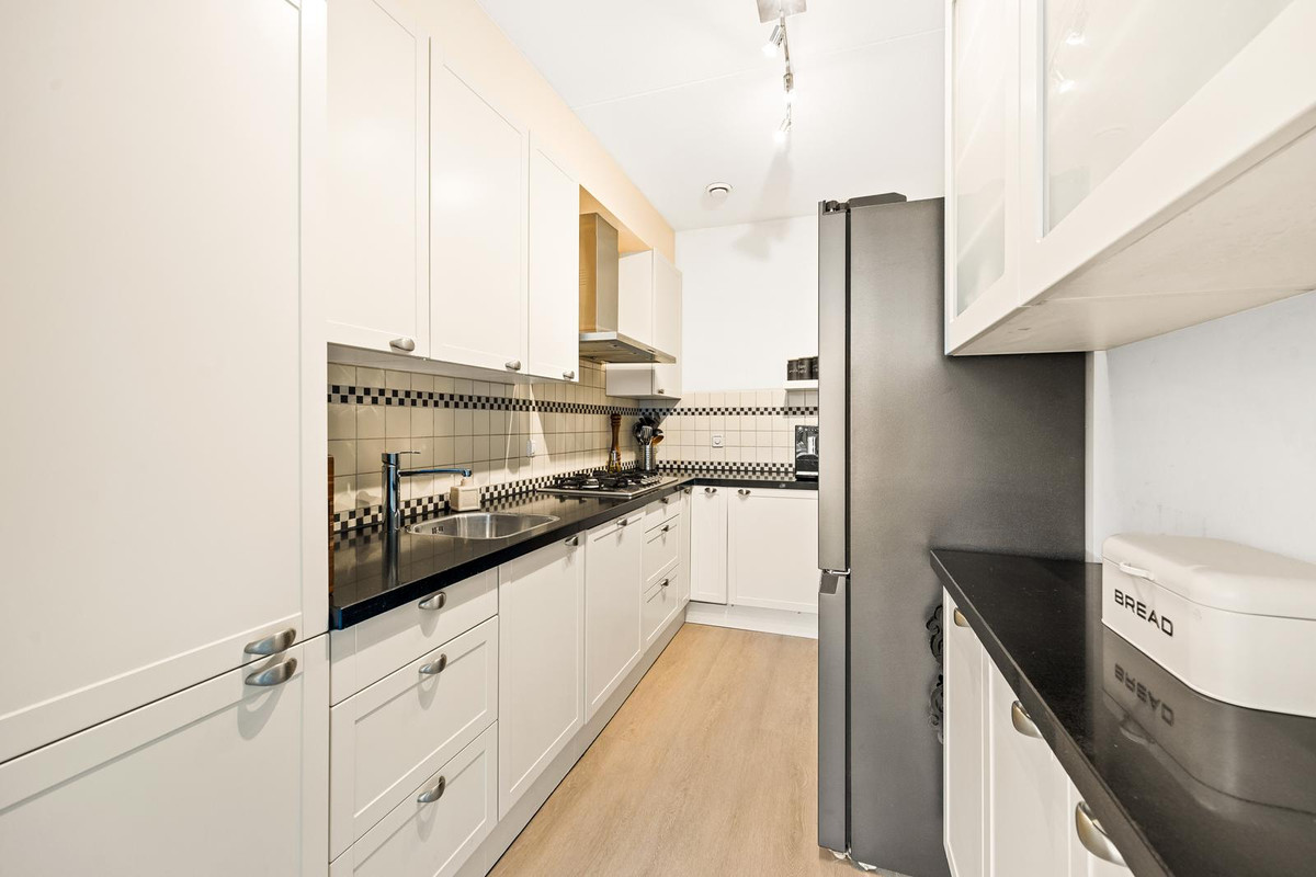 Tussenwoning te koop: Raaltestraat 12, 'S-Gravenhage
