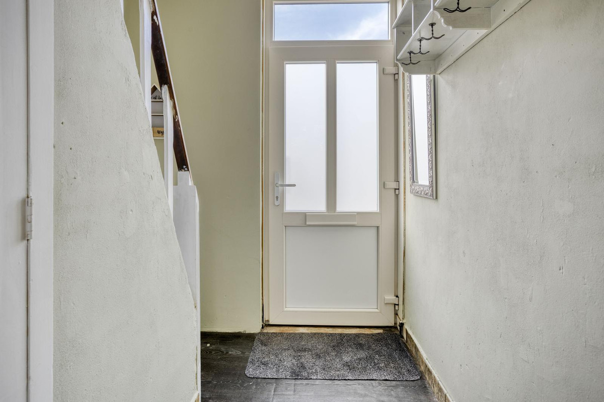 Tussenwoning te koop: Wethouder Jonkersstraat 48, Halsteren