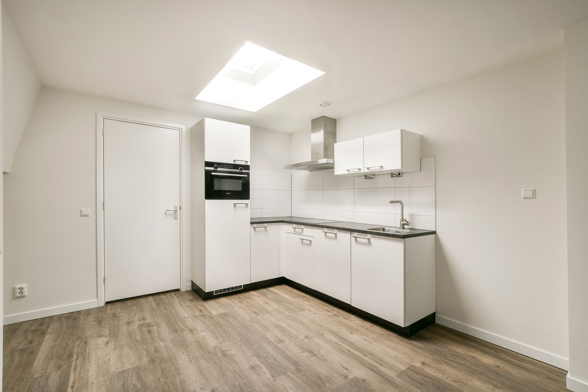 Tussenwoning te koop: Herenstraat 27, Leiden