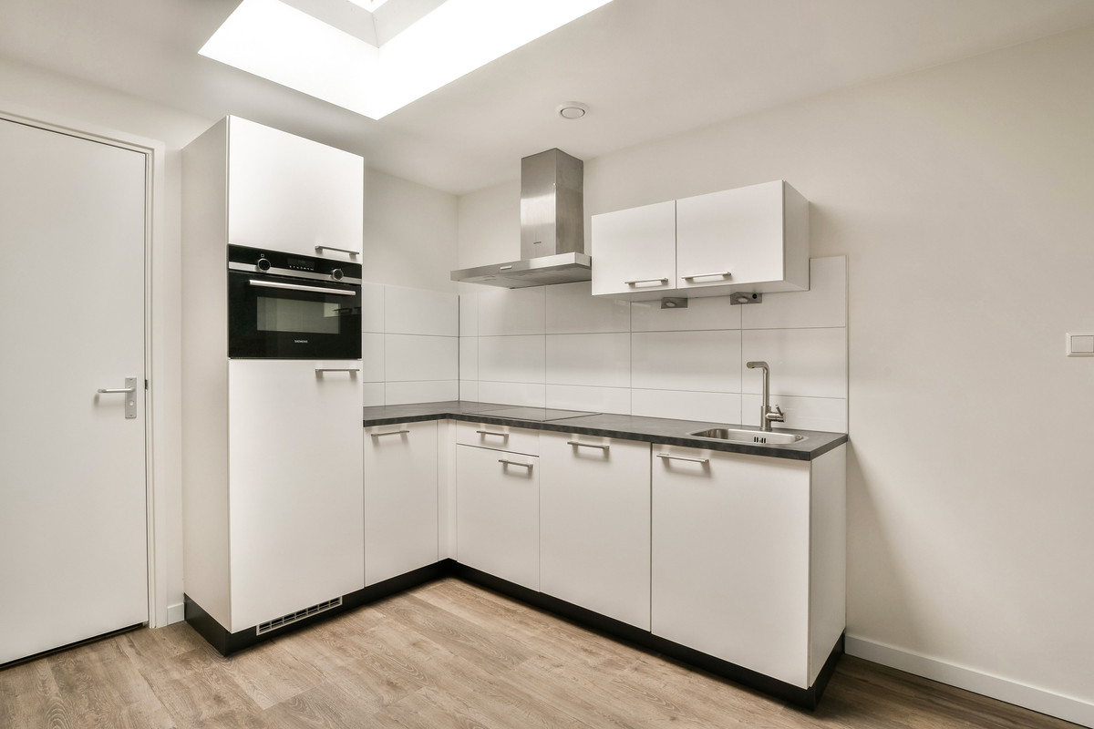Tussenwoning te koop: Herenstraat 27, Leiden
