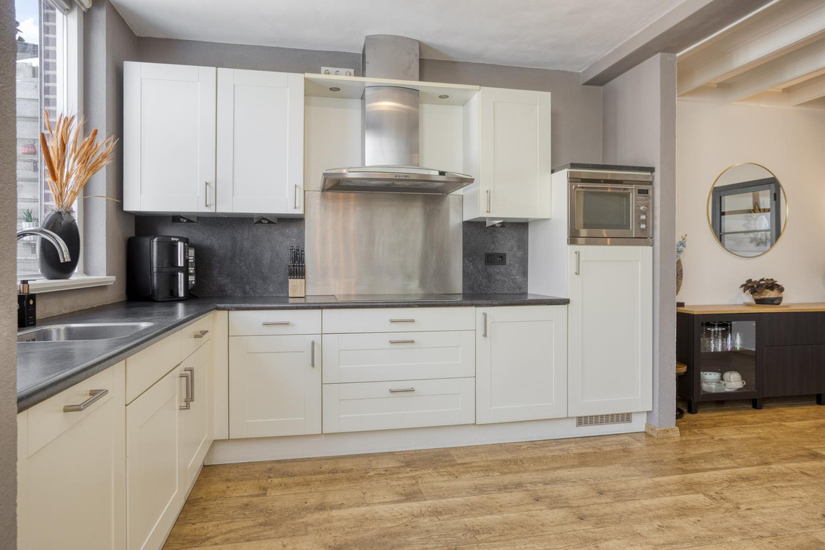Tussenwoning te koop: Wethouder Jonkersstraat 50, Halsteren