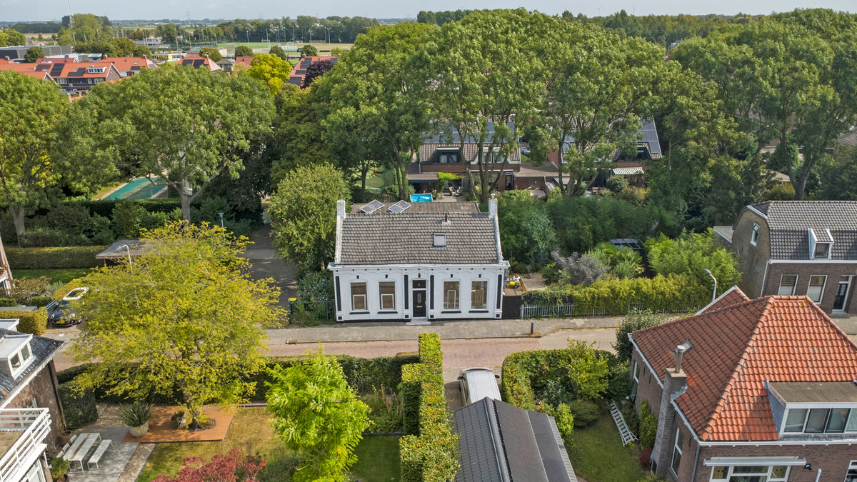 Vrijstaande woning te koop: Molenstraat 45, Strijen