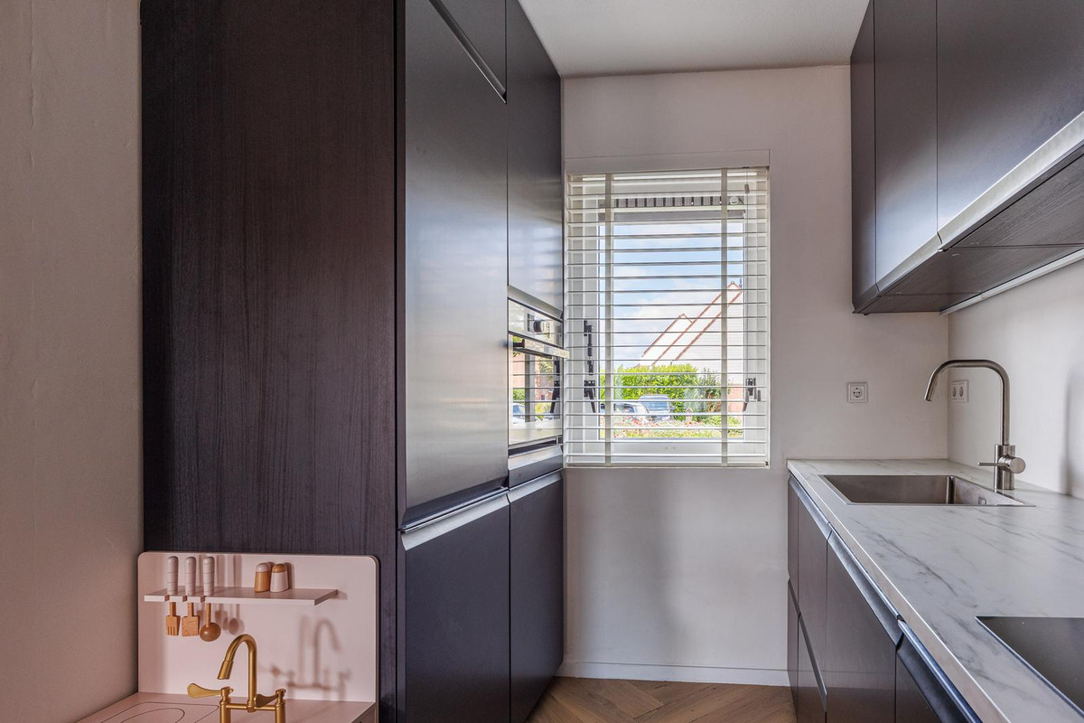 Tussenwoning te koop: Bieskamp 100, Druten