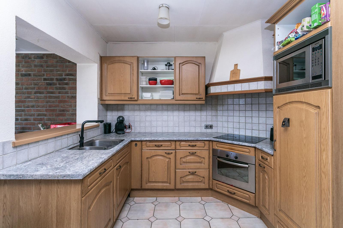 Tussenwoning te koop: Jonker Cluttstraat 51, Brunssum