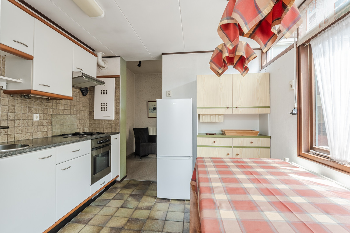 Tussenwoning te koop: Burg van Gentsingel 11, Schipluiden
