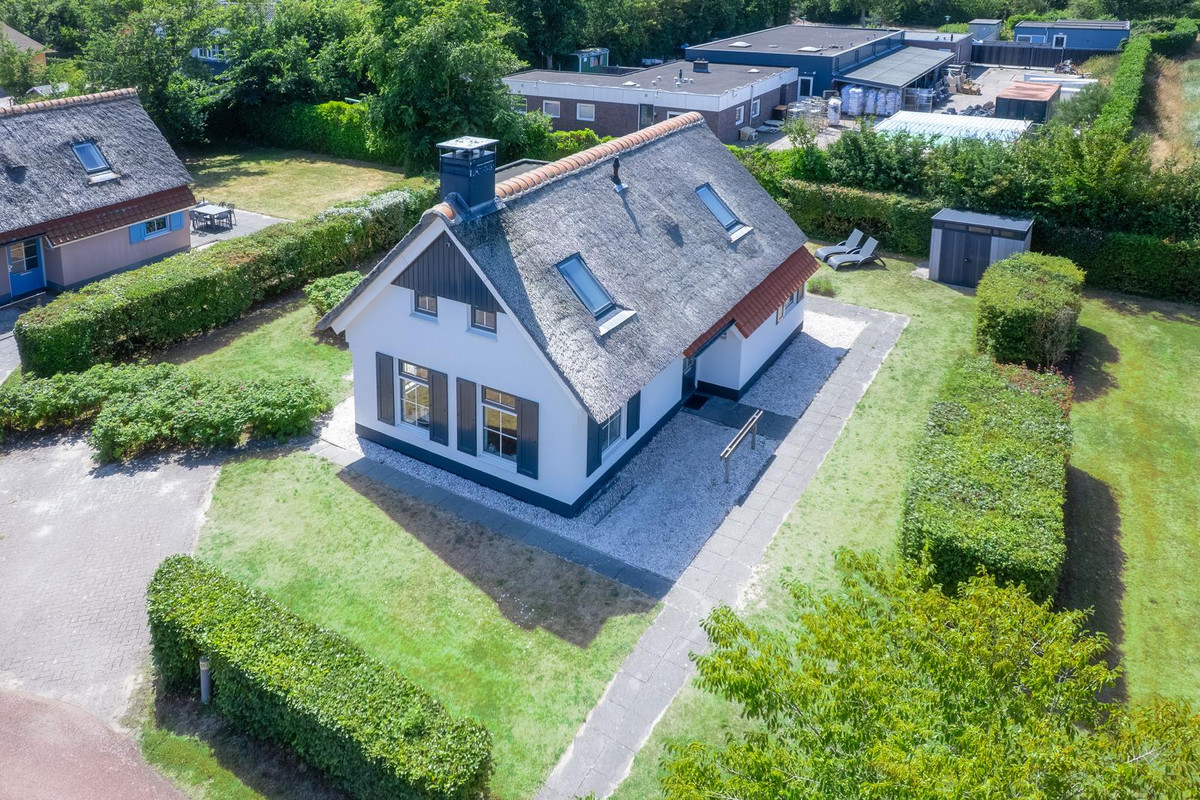 Vrijstaande woning te koop: Bosrandweg 369A513, De Koog