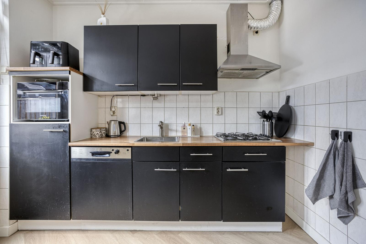 Tussenwoning te koop: Genechtstraat 55, Druten