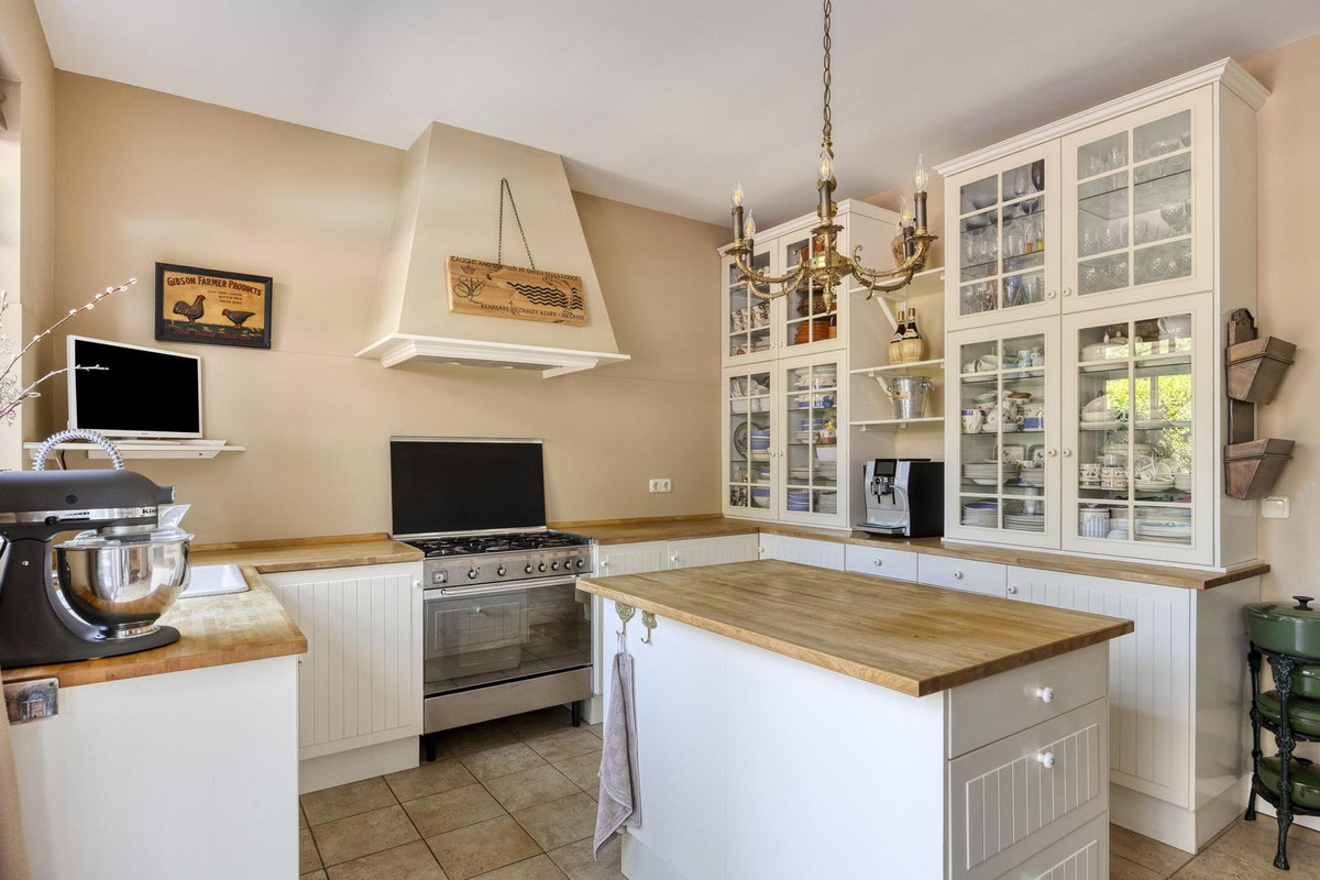 Tussenwoning te koop: Herenweg 20, Warmond