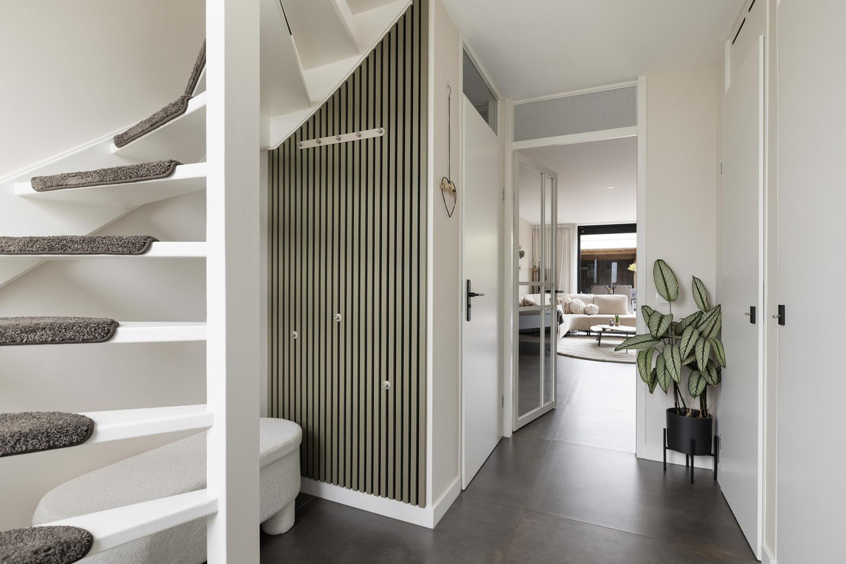 Tussenwoning te koop: Rusthout 11, Dordrecht
