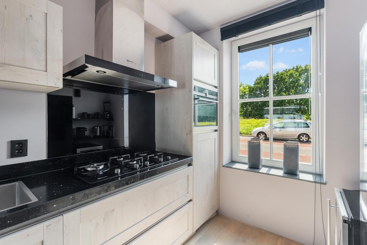 Tussenwoning te koop: Ringdijk 496D, Ridderkerk