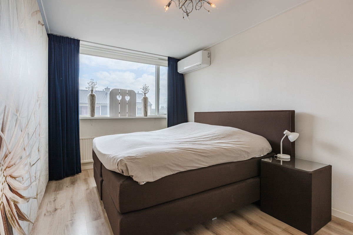 Tussenwoning te koop: Kennedylaan 26, Andel