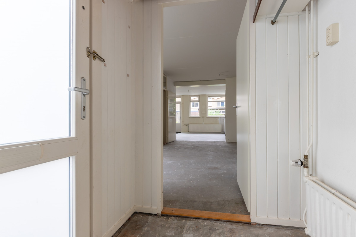 Tussenwoning te koop: Dennenlaan 13, Leimuiden