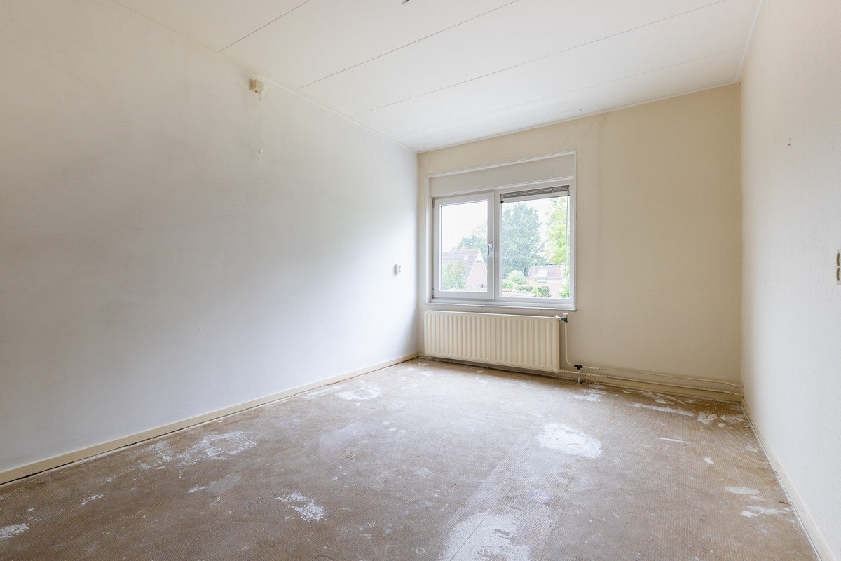 Tussenwoning te koop: Dennenlaan 13, Leimuiden