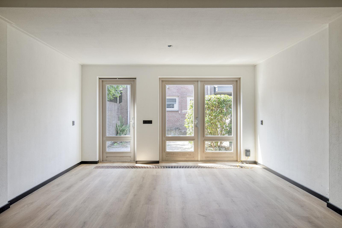 Tussenwoning te koop: Lange Bunder 60, Bavel