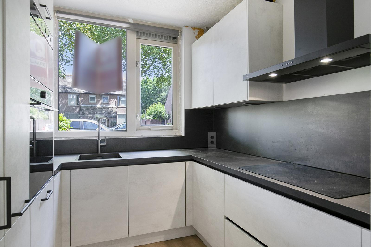 Tussenwoning te koop: Lange Bunder 60, Bavel