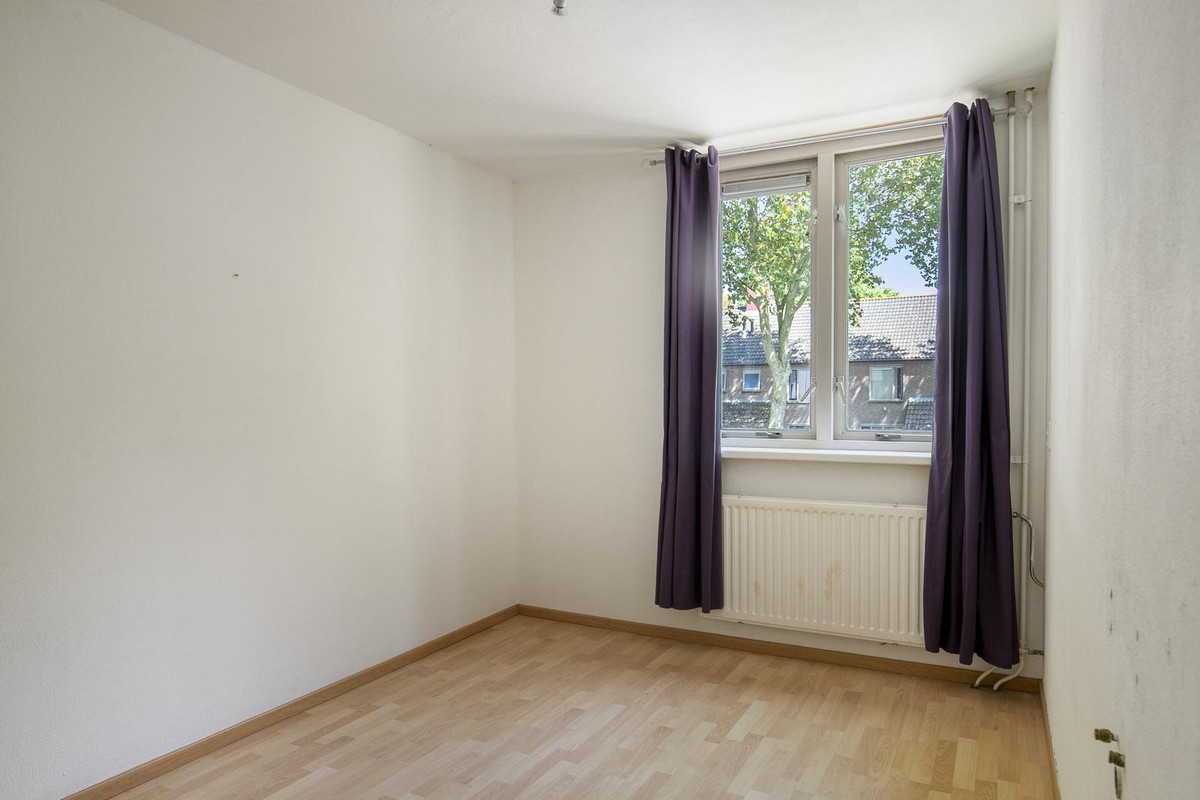 Tussenwoning te koop: Lange Bunder 60, Bavel